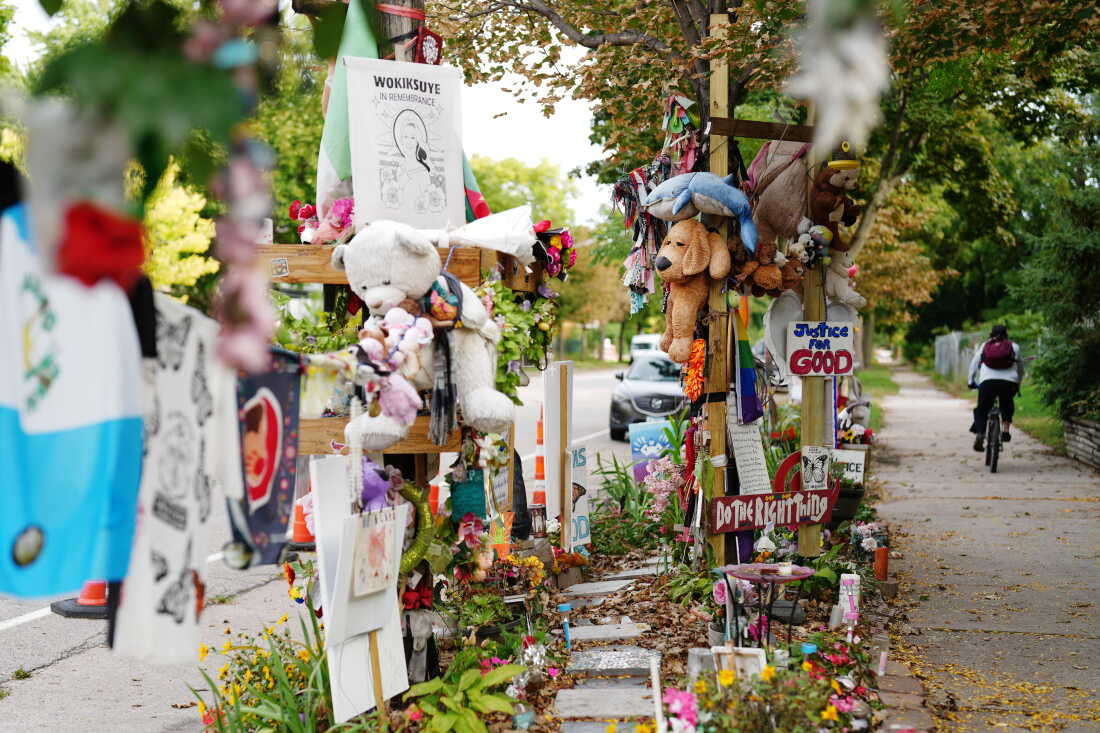 A memorial for Renee Good, who was killed by federal agents in Minneapolis in January, remains in place at the site of her death, Thursday, Oct. 1, 2026, in Minneapolis. (AP Photo/Ellen Schmidt)