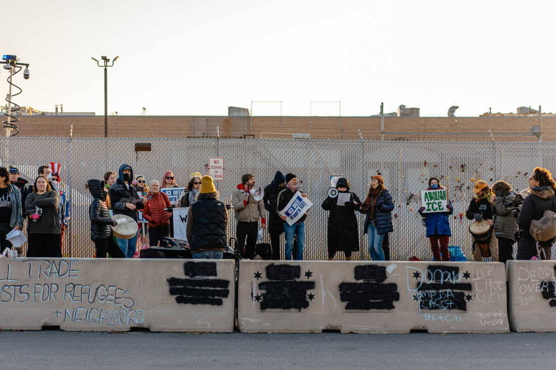 Demonstrators gather within the "free speech zone" near an Immigration and Customs Enforcement processing and detention facility on October 31, 2025, in Broadview, Ill.