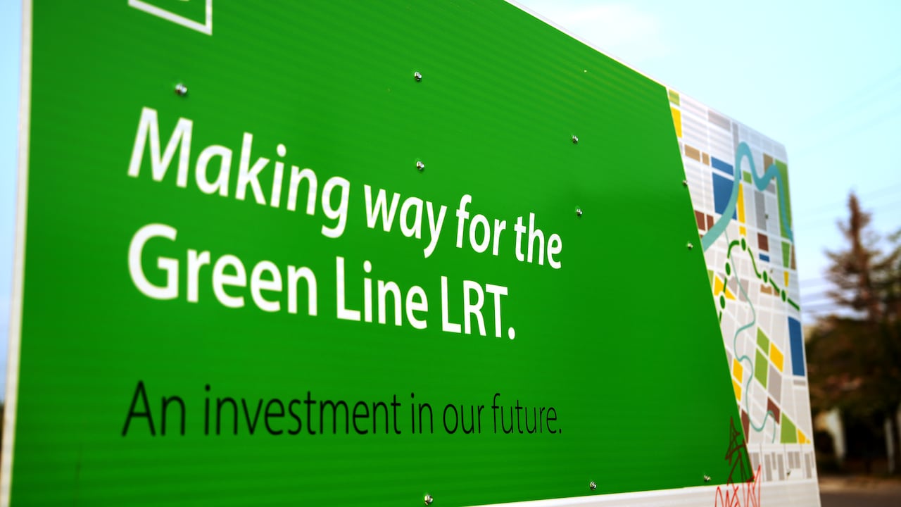 A sign for the Calgary Green Line LRT shows the former Lilydale Chicken Packaging plant in the Southeast community of Ramsay. This is one of the vacant pieces of land held for a future Green Line LRT project.