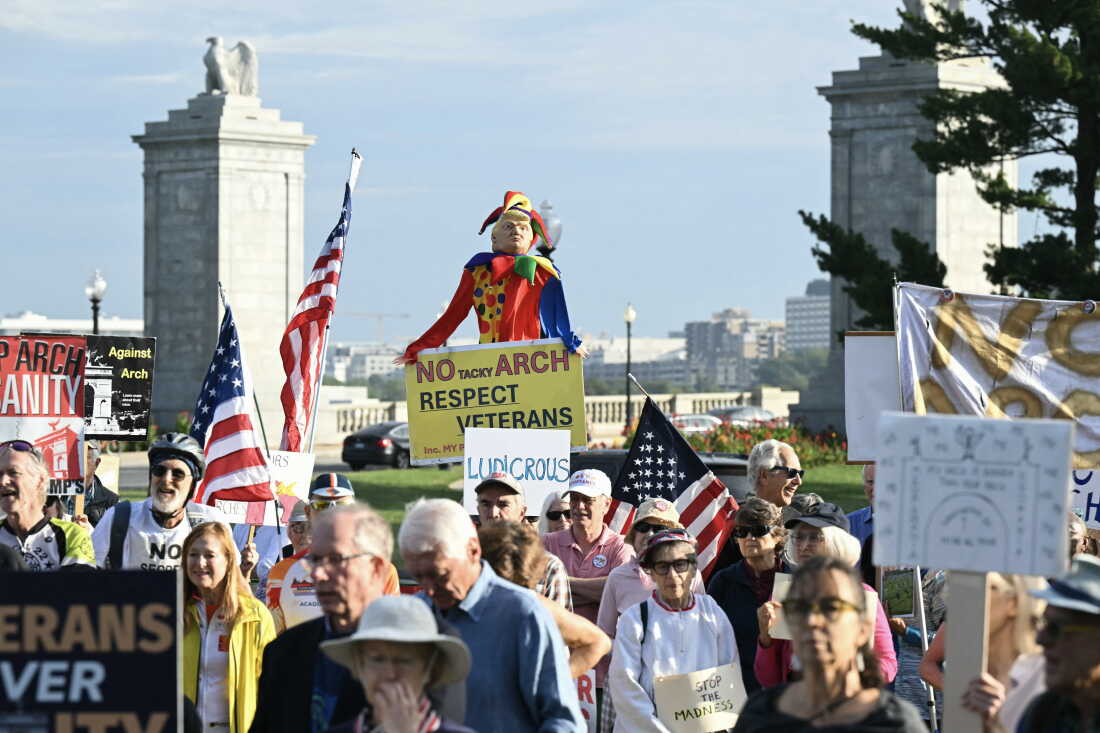 Demonstrators gathered Thursday morning to protest Trump's proposed arch, which would stand in a traffic circle on the bridge connecting the National Mall to Arlington National Cemetery.