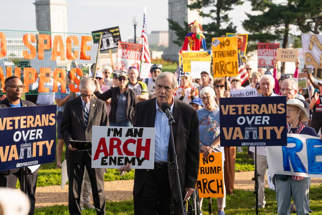 Sen. Jeff Merkley, D-Ore., speaks to demonstrators at Thursday's event. His efforts to block federal funding for the arch were rejected by a GOP senator earlier in the week.