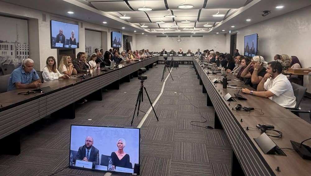Participants listen to speeches at a conference on Iran’s human rights situation, held in Geneva on 28 September 2026 alongside the 63rd session of the UN Human Rights Council
