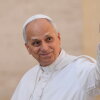 Pope Leo XIV waves as he arrives for his weekly general audience in St. Peter's Square at the Vatican on Oct.1, 2025.
