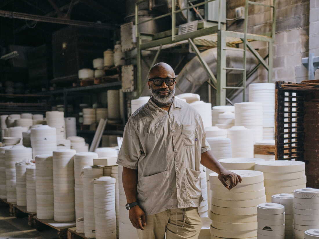 Theaster Gates poses for a portrait at the Pickard China factory in Antioch, Ill. The 53-year-old Chicago-based artist recently acquired the business for an undisclosed sum.