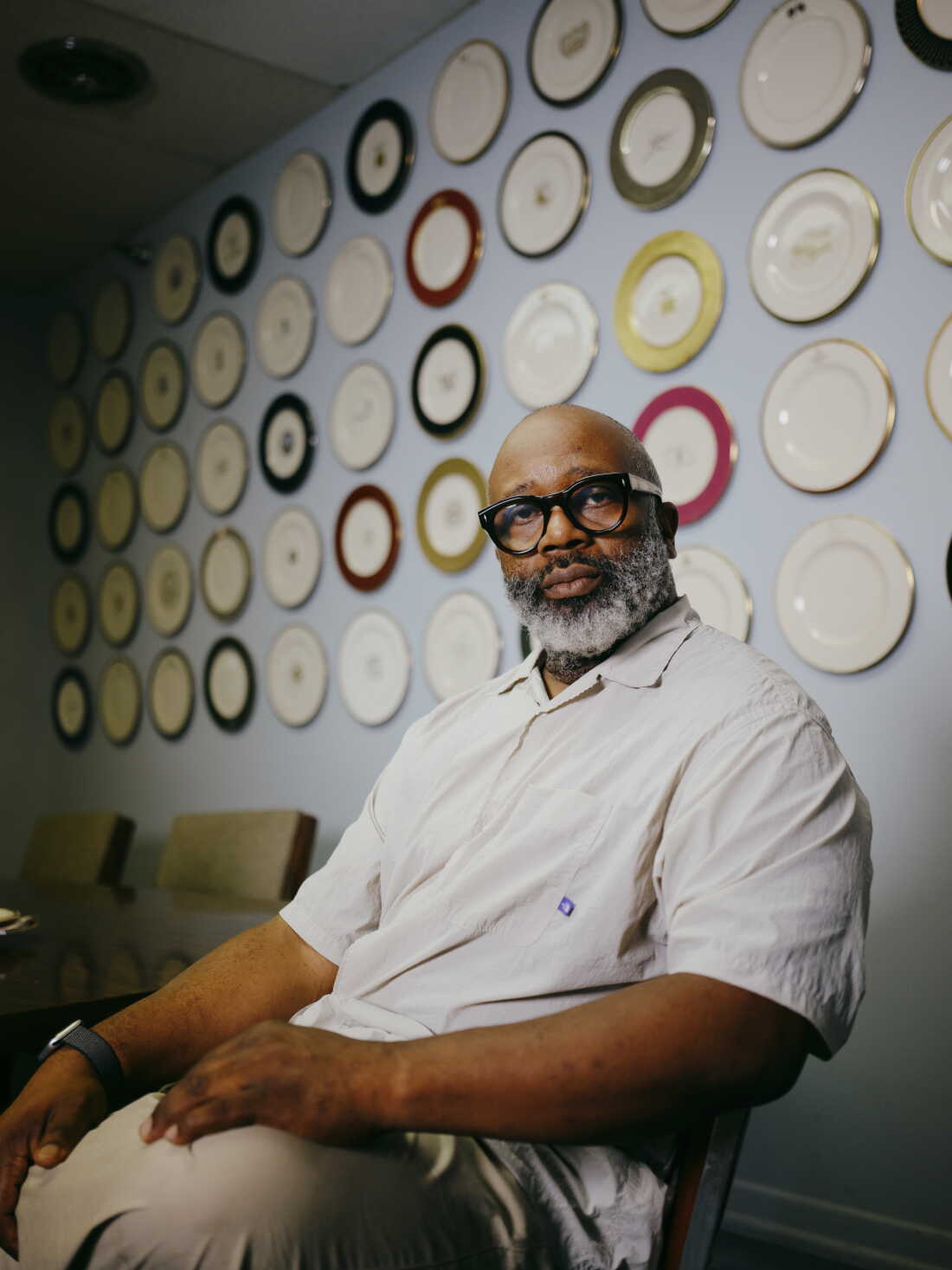 Theaster Gates poses for a portrait at the Pickard Factory office in Antioch, Ill.