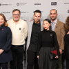 Kirstine Barfod (from left), Mark Perlmutter, Thaer Ahmad, Poh Si Teng, Feroze Sidhwa and Reem Haddad stand for a group photo as they attend the premiere of "American Doctor" at the 2026 Sundance Film Festival on January 23.