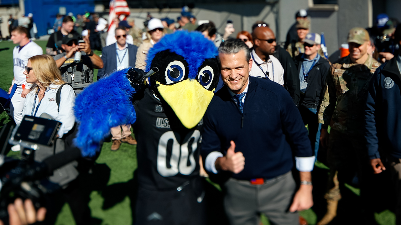 Pete Hegseth handles Air Force-Navy coin toss after showing off basketball skills at Academy