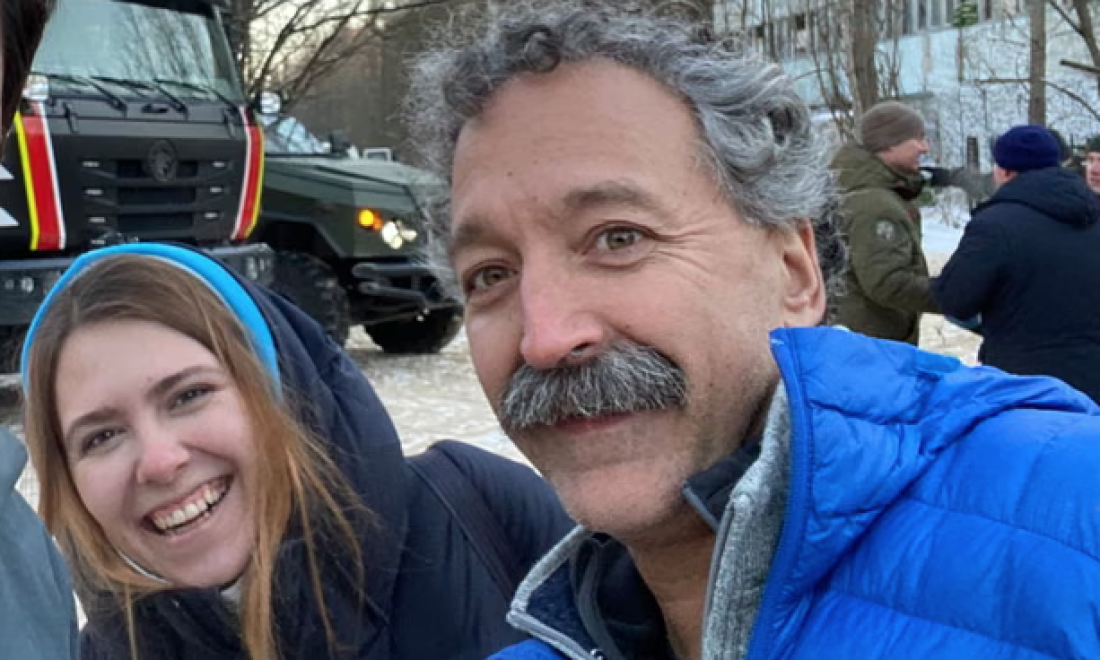 Oleksandra Kuvshynova is on the left side of the photo, and Pierre Zakrzewski is on the right side.