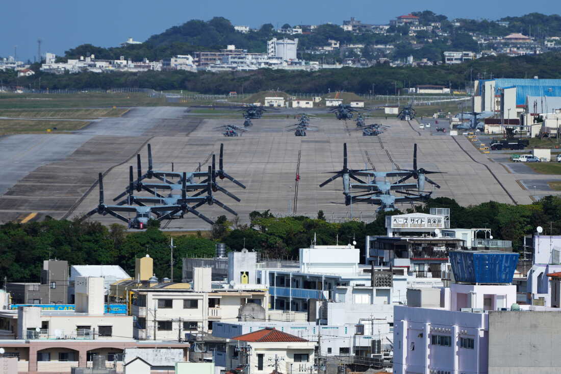 U.S. MV-22 Osprey transport aircraft are parked at the U.S. Marine Corps Air Station Futenma in Ginowan, on the main island of the Okinawa archipelago, southern Japan, Tuesday, Feb. 18, 2025.