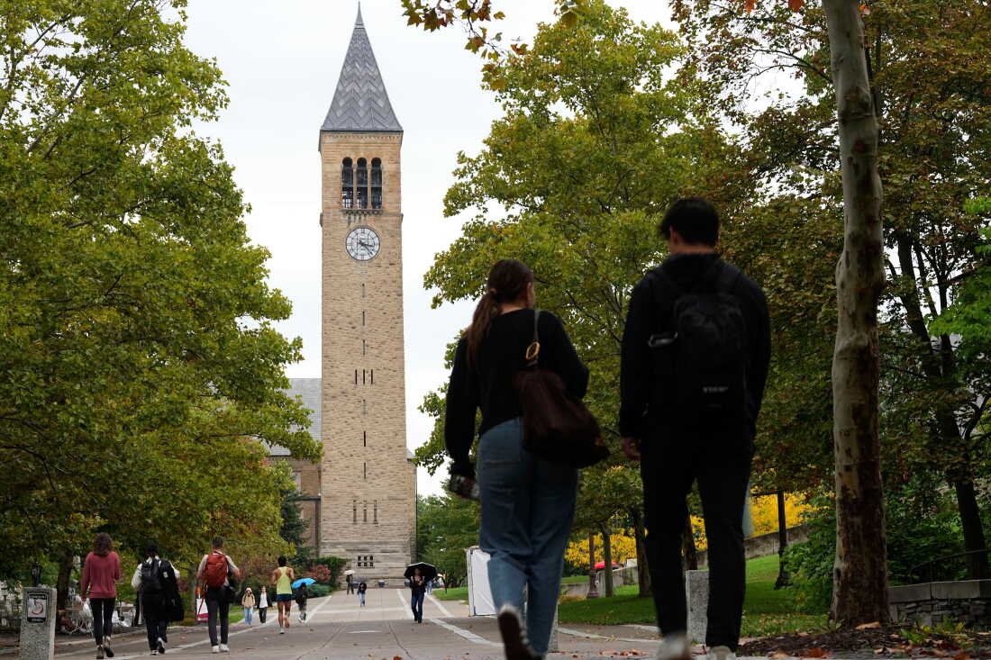Pedestrians walk on the campus at Cornell University in Ithaca, N.Y., Thursday, Oct. 1, 2026.