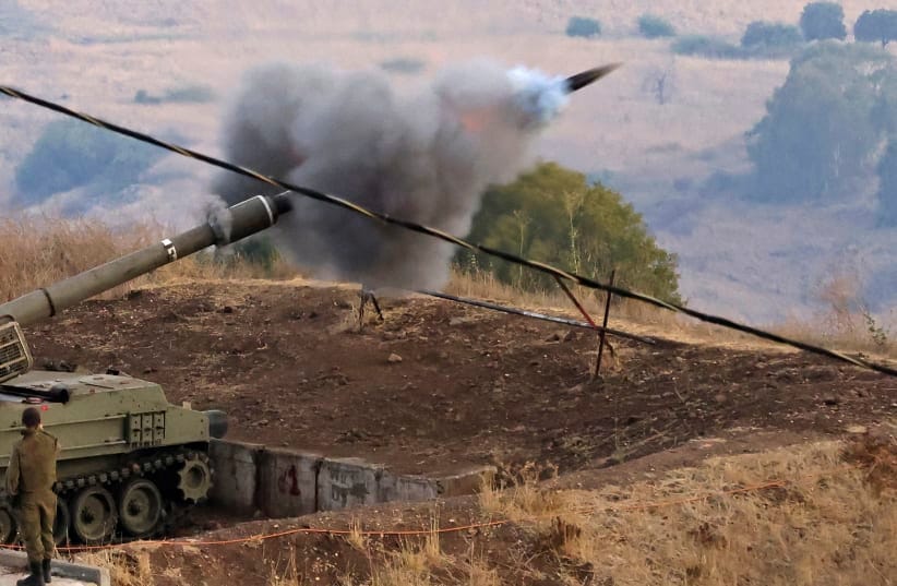 Soldiers of Israel's artillery unit take part in a drill at the military base of Har Dov on Mount Hermon, a strategic and fortified outpost at the crossroads between Israel, Lebanon, and Syria, in the annexed Golan Heights on August 28, 2023. 