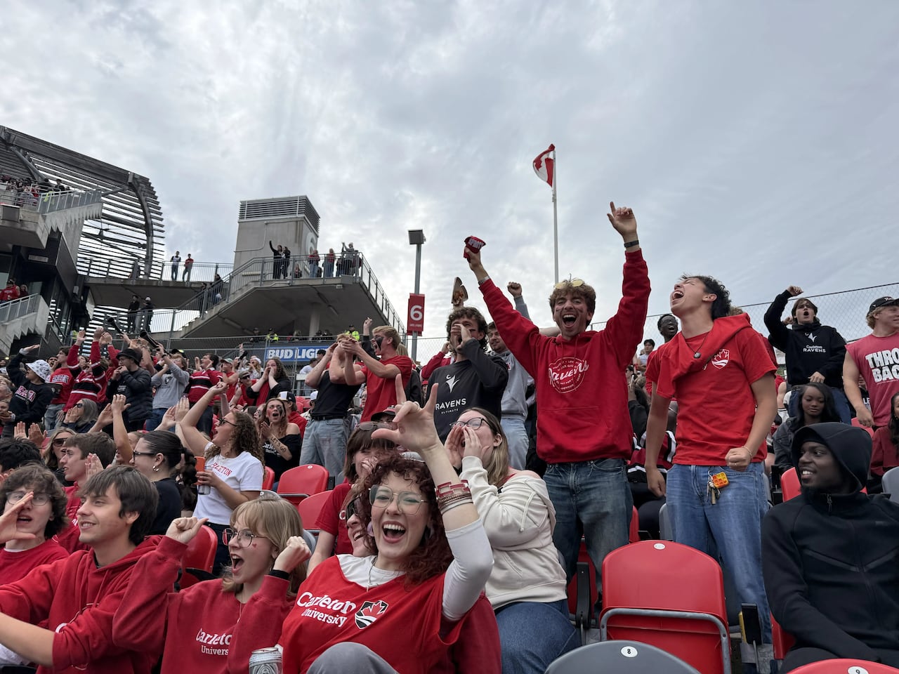 An image of fans cheering.