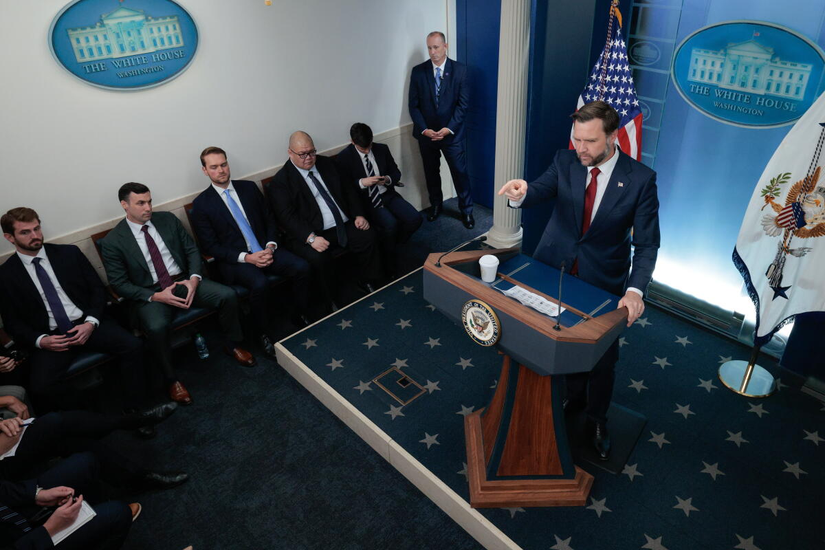 Vice President JD Vance talks to reporters at the White House. 
