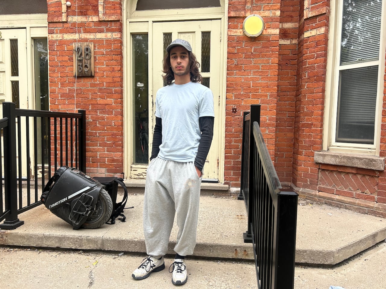 Guiseppe Awada, who has lived in a rented room in the house for about six months, says he was "saddened and shocked" when he learned that he'll have to move from the building by Nov. 30.