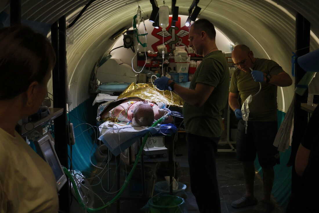 Ukrainian military medics treat a wounded Ukrainian soldier in the field hospital near the frontline in the southeastern reigion of Zaporizhzhia on Sept. 12. The vast majority of casualties take place in the so-called Kill Zone, a band about 10 to 15 miles wide on both sides of the frontline, which stretches more than 700 miles from north to south.