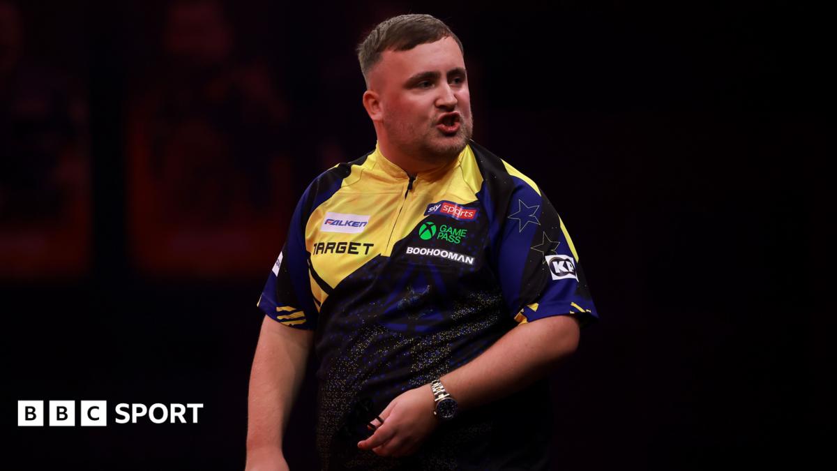 Luke Littler during a darts match