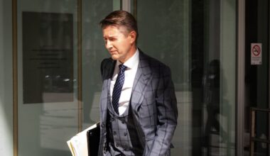 High-flying lawyer goes on trial for writing bad cheque allegedly to cover for collapsing firm