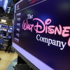 The Walt Disney Co. logo appears on a screen above the floor of the New York Stock Exchange on Aug. 8, 2017.