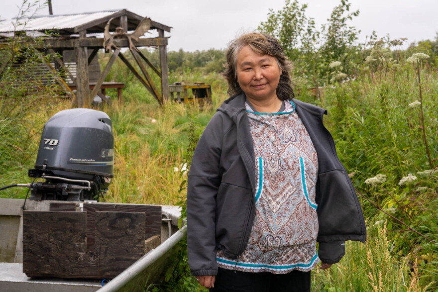 Mary Nicholai, president of the Kwethluk IRA, visits an empty fish camp on Monday, Aug. 17, 2026.