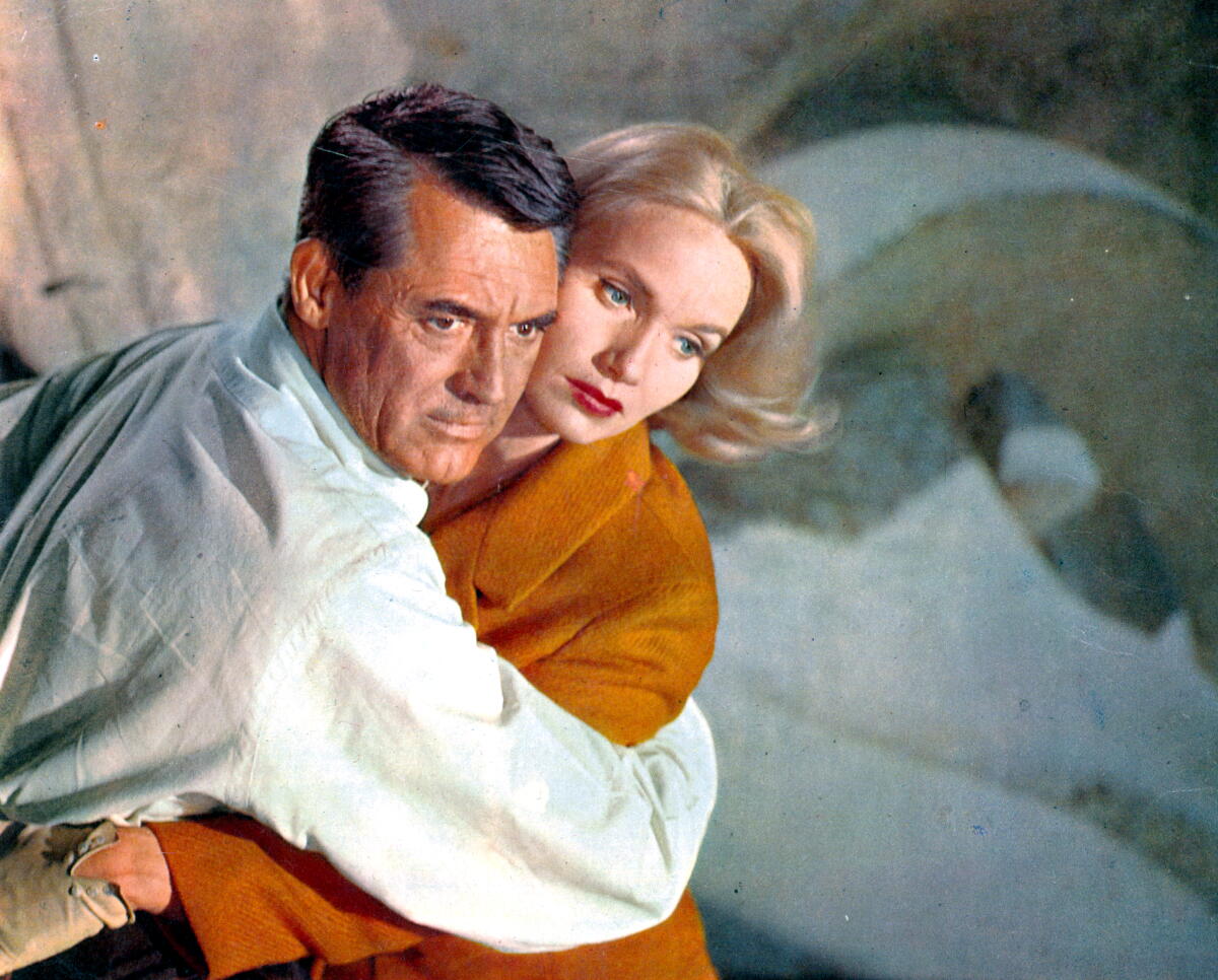 Cary Grant holds Eva Marie Saint in a scene from "North by Northwest."