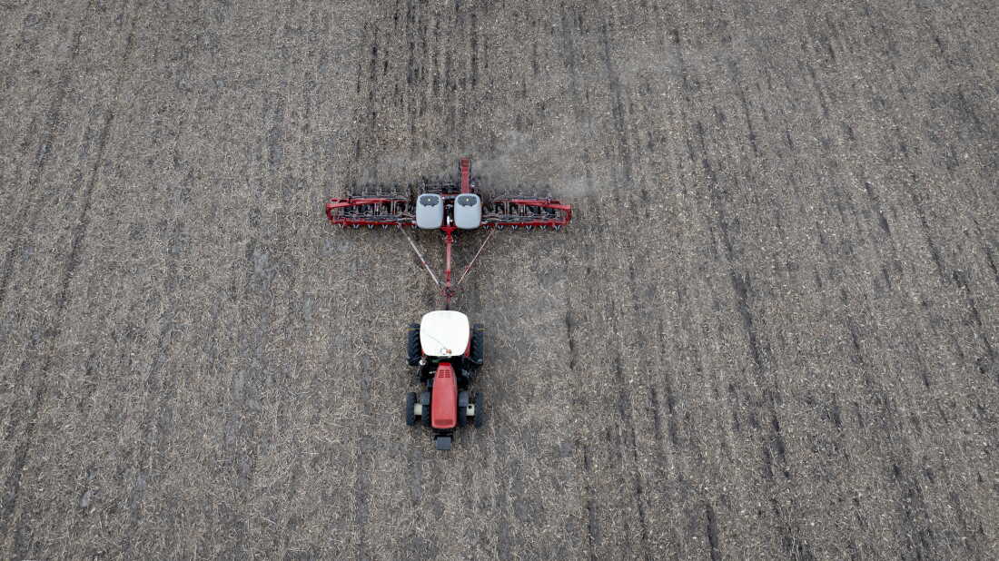 In this aerial view, Dan Duffy uses a tractor to plant soybeans on land he farms with his brother on April 28, 2025 near Dwight, Illinois.
