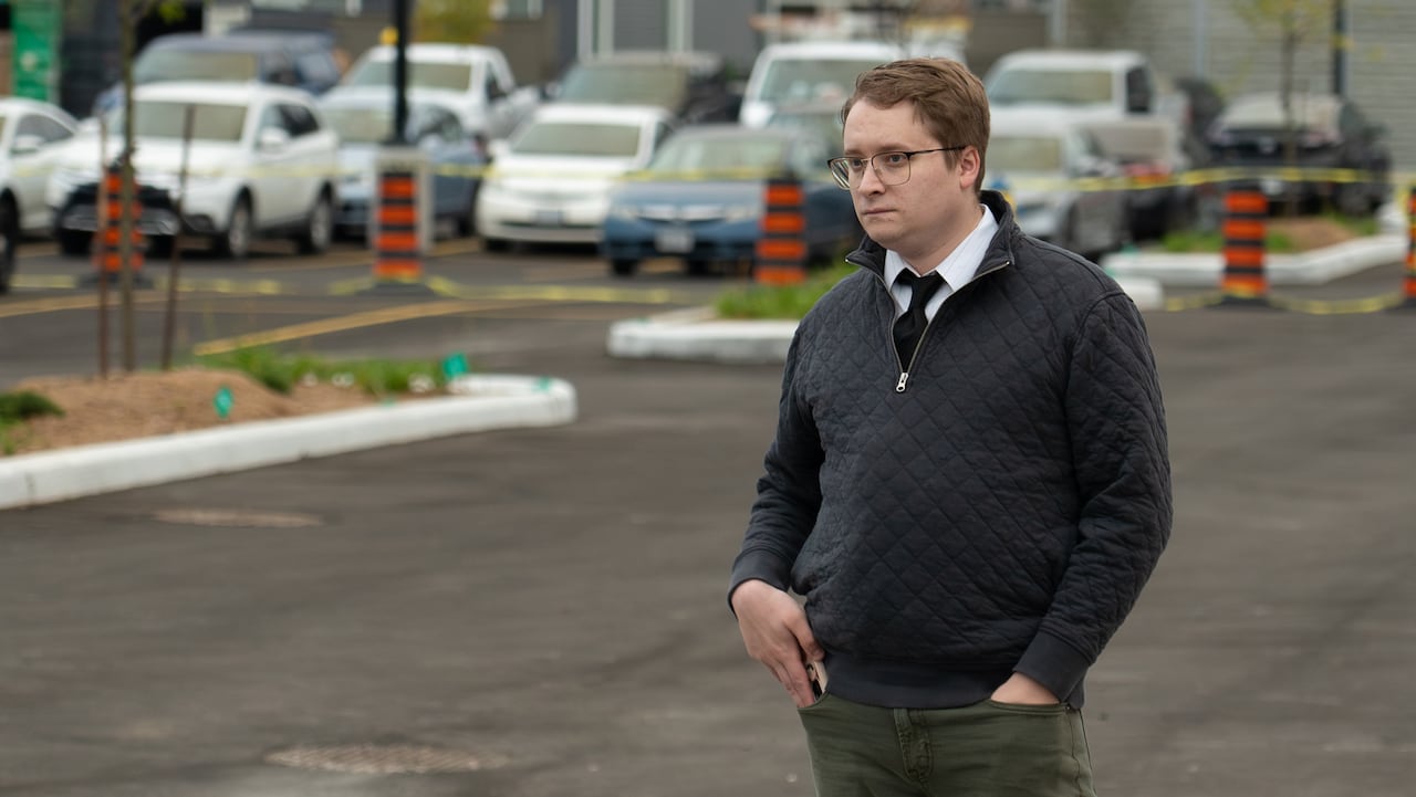 A man in a parking lot