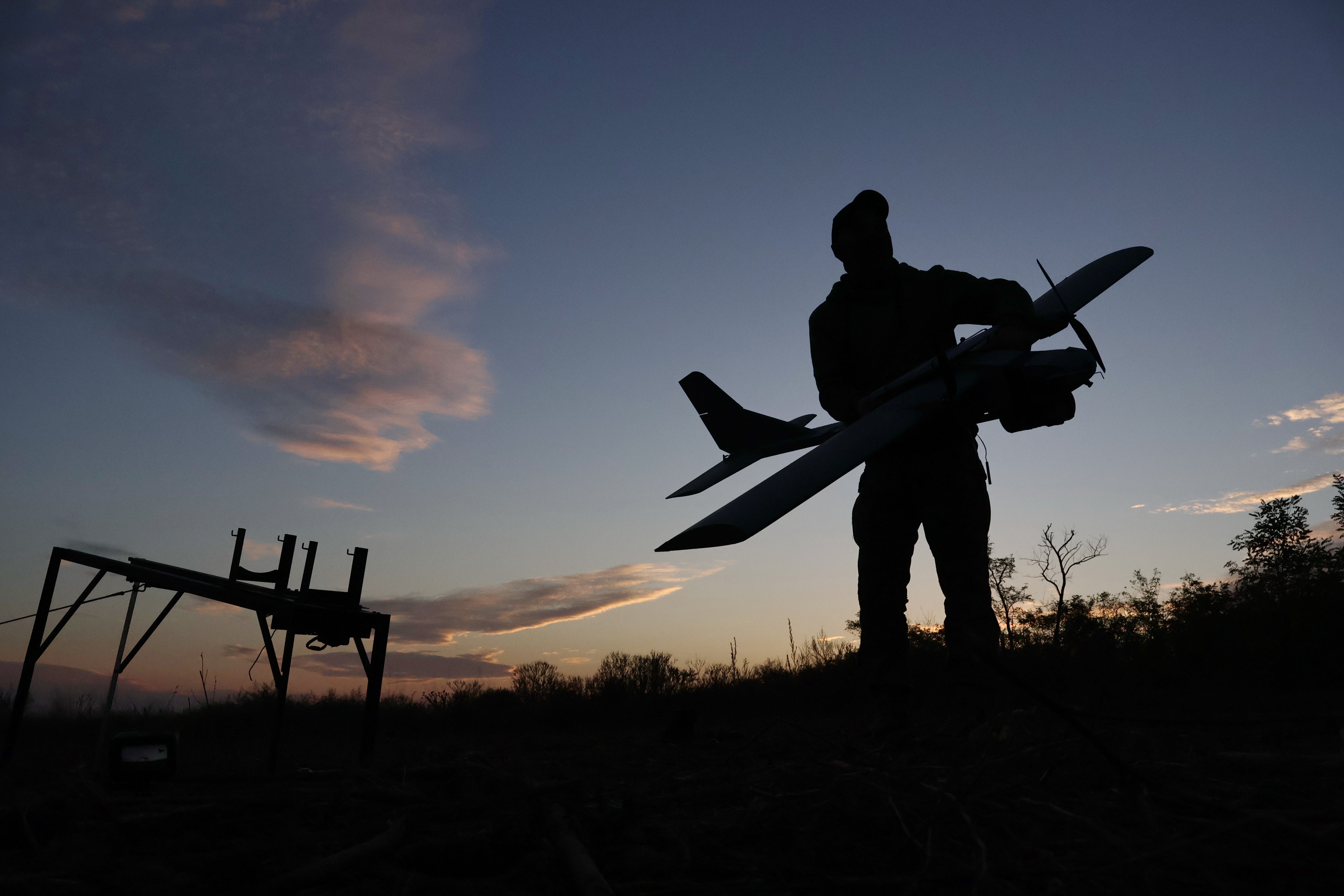 A Ukrainian serviceman launches a drone towards Russian positions at the front line in the Zaporizhzhia region, Ukraine, on Wednesday, 7 October 2026