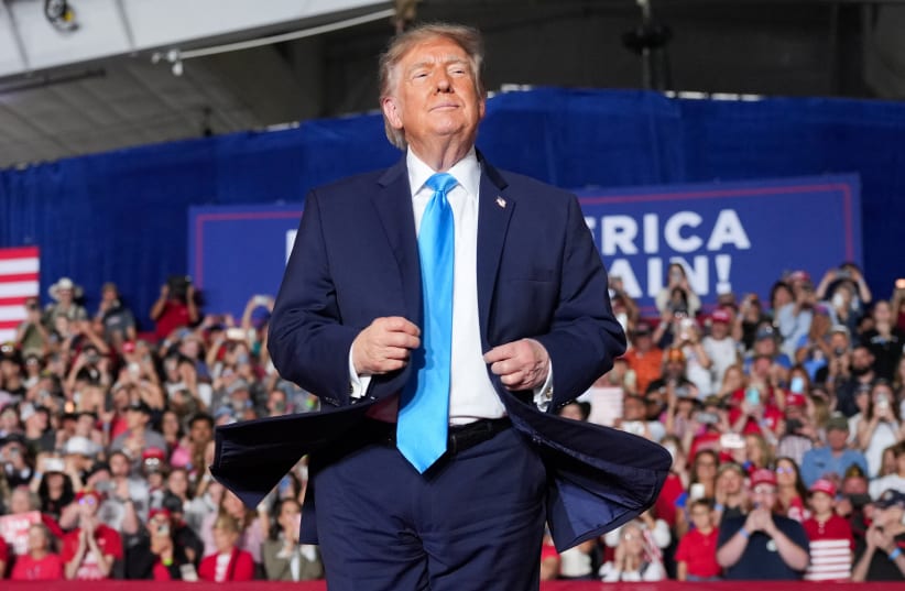 US President Donald Trump dances on stage during a rally at Pinnacle Bank Expo Center in Grand Island, Nebraska, US, October 5, 2026.