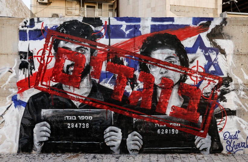 Graffiti depicting Yuval Abraham and Rachel Szor, the directors of the documentary film NAZA, and the word ''traitors'' in Hebrew, on a wall in Ashdod Tuesday, September 15, 2026.