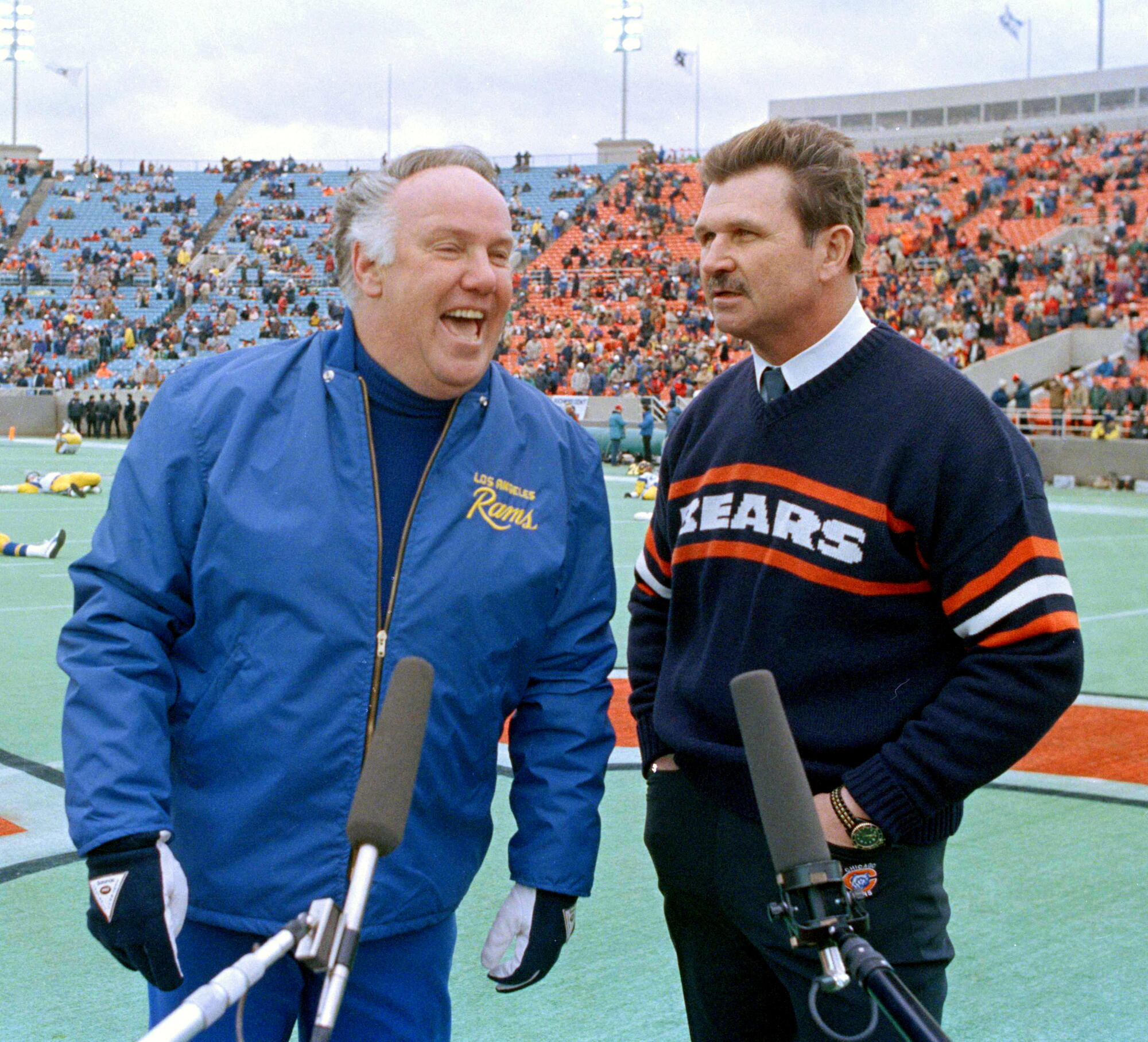 Rams coach John Robinson, left, and Bears coach Mike Ditka stand together before the NFC championship game on Jan. 12, 1986.