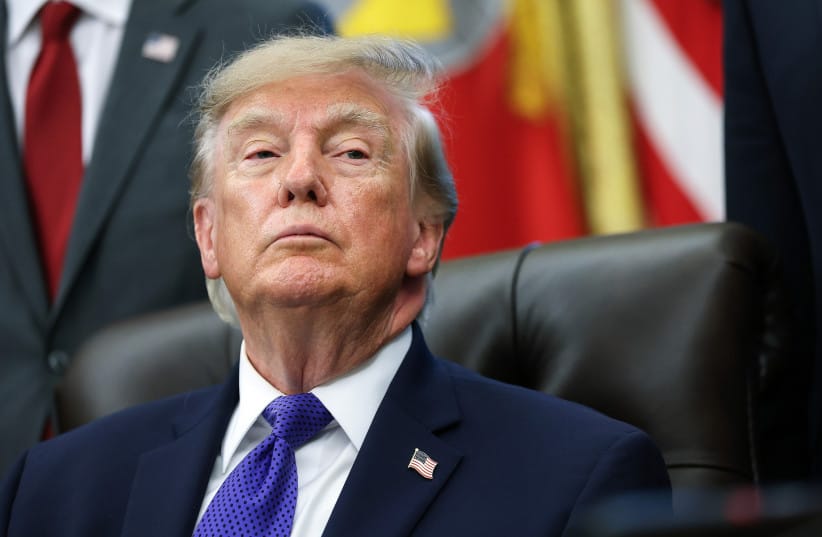 US President Donald Trump listens to a reporters question in the Oval Office at the White House on September 28, 2026; illustrative