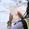 A Wake County Board of Elections employee prepares a mail-in ballot to be sent out to a voter in September in Raleigh, N.C.