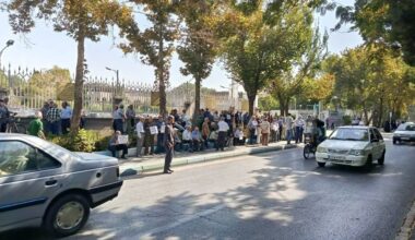 Retired steel factory workers gather along a street in Isfahan, Iran, on October 11, 2026, to protest inadequate pensions and worsening living conditions