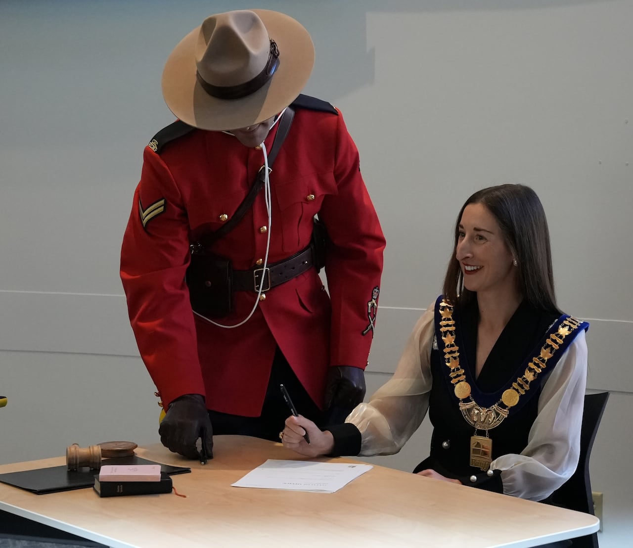 A woman is sworn in to Banff council.