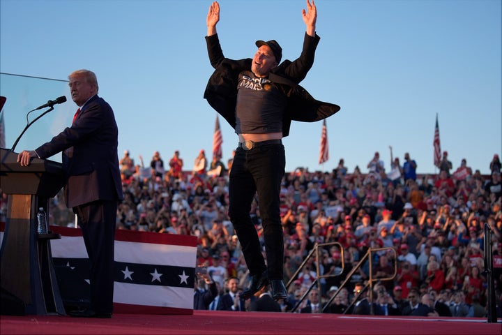 Elon Musk jumps on the stage behind Donald Trump at a second rally in Butler, Pennsylvania shortly before the 2024 election.