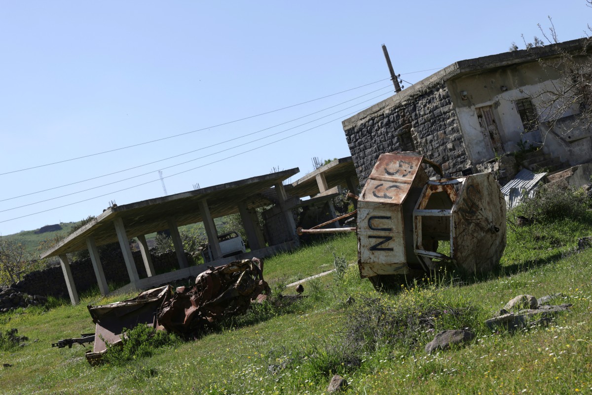 A photograph shows a destroyed UN Disengagement Observer Force observation post in the southern Syrian village of Burayqah, in the province of Quneitra on April 22, 2026. (AFP)