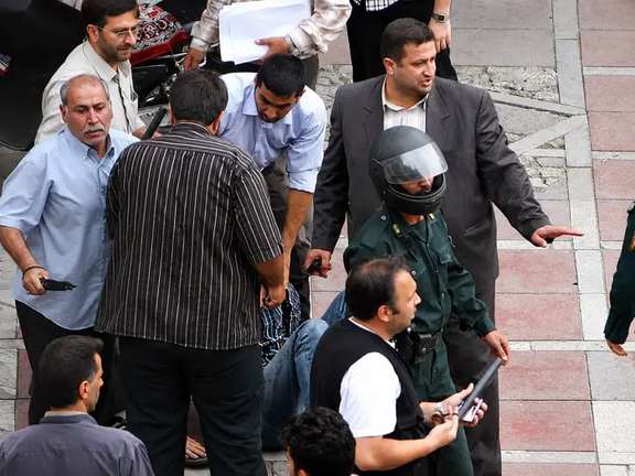 Iranian security and plainclothes forces confronting protestors during the 2009 Iranian election protests following the disputed presidential election.