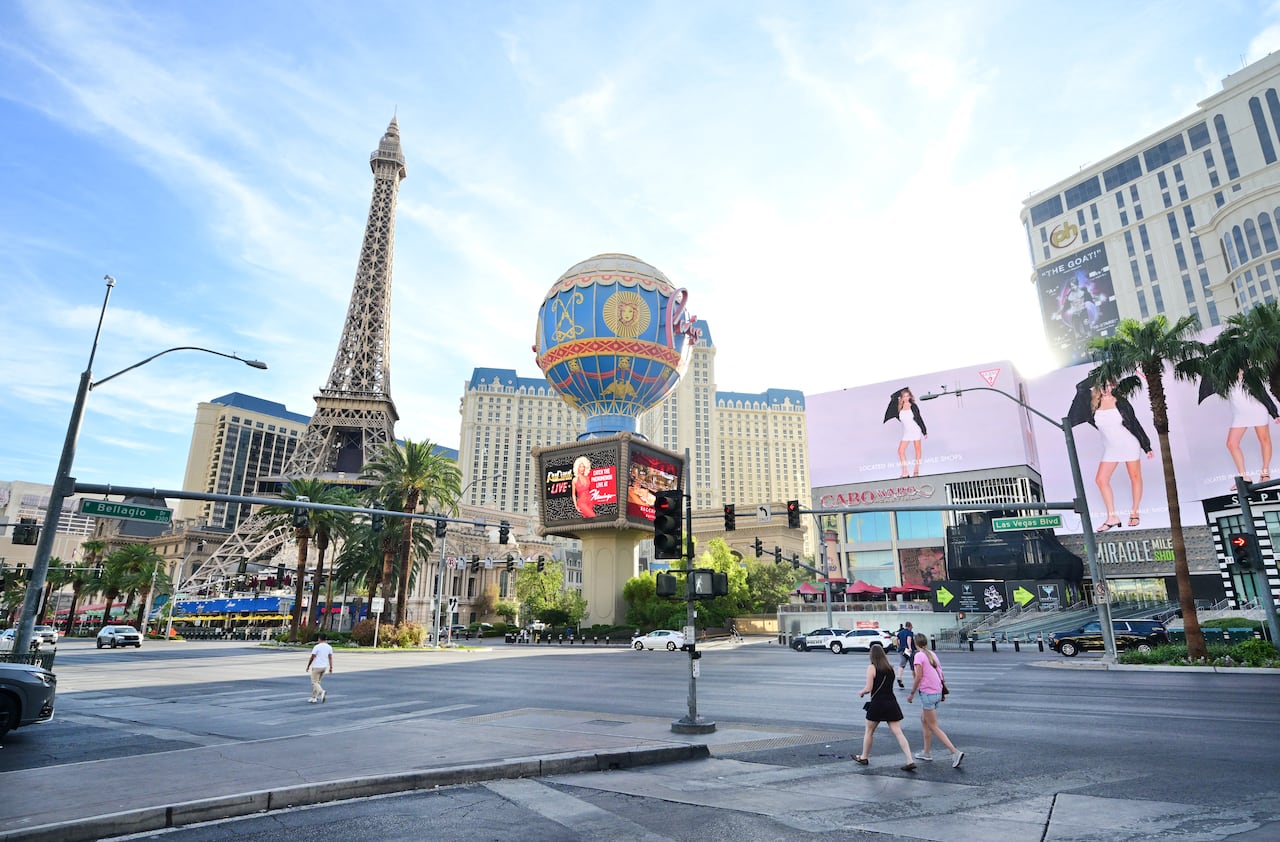 People walk along Las Vegas Boulevard in Las Vegas, Nevada on August 20, 2026.