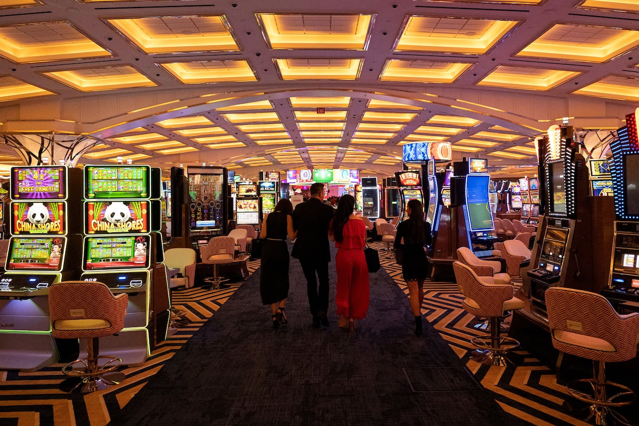 People walk through the casino floor at Resorts World Las Vegas hotel and casino. Locals know well Canadians are missing from this adult playground — and it could affect the midterm election results, political watchers say.