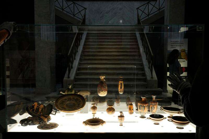 Greek antiquities dating to the 6th and 5th centuries B.C. are displayed during a repatriation ceremony at the National Archaeological Museum in Athens, Greece, Tuesday, Oct. 13, 2026, after 22 artifacts illegally removed from Greece were returned by Israel. (AP Photo/Thanassis Stavrakis)