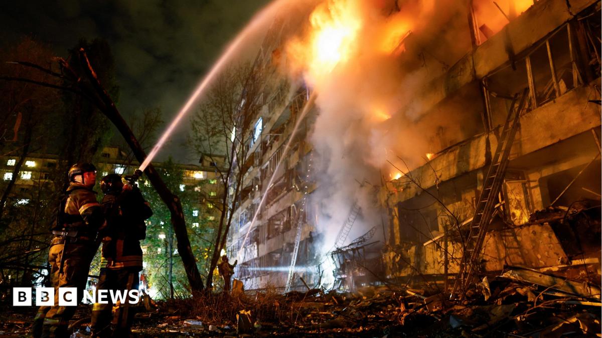 A still from a video of a data centre on fire following a Ukrainian strike, in a BBC Verify branded border.