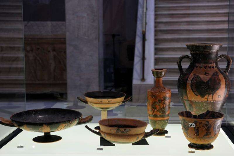 Greek antiquities dating to the 6th and 5th centuries B.C. are displayed during a repatriation ceremony at the National Archaeological Museum in Athens, Greece, Tuesday, Oct. 13, 2026, after 22 artifacts illegally removed from Greece were returned by Israel. (AP Photo/Thanassis Stavrakis)