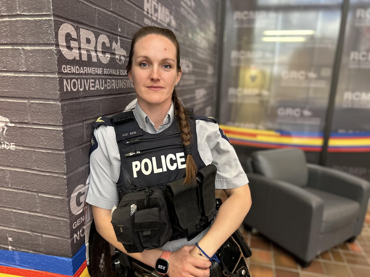 Medium shot of woman in police uniform