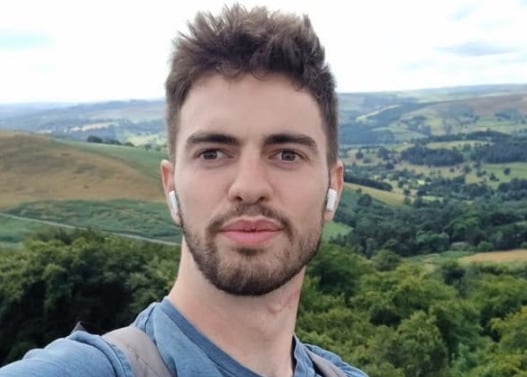 A young man wearing airpods