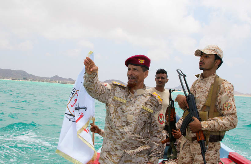 Houthi control around Bab el-Mandeb gives Iran-aligned forces leverage over a second major maritime choke point, opposite the Strait of Hormuz on the other side of the Arabian Peninsula. A Yemeni government army officer gestures as he rides a boat in Bab el-Mandeb, Yemen, April 2.