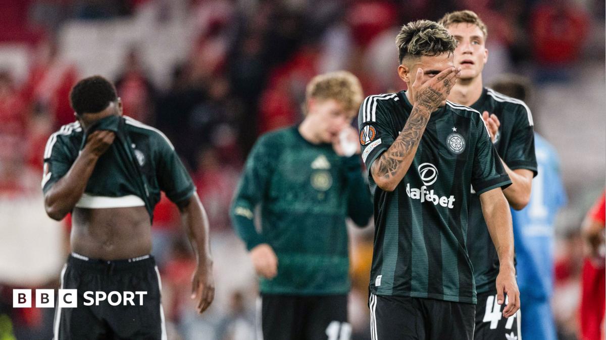 Celtic players look dejected after defeat by Benfica