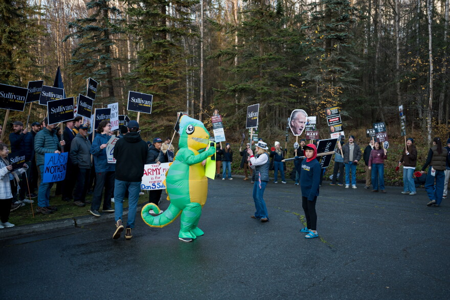 Ahead of Thursday night's Senate debate at Alaska Public Media's studio, supporters for Dan Sullivan and Mary Peltola rallied in the parking lot.