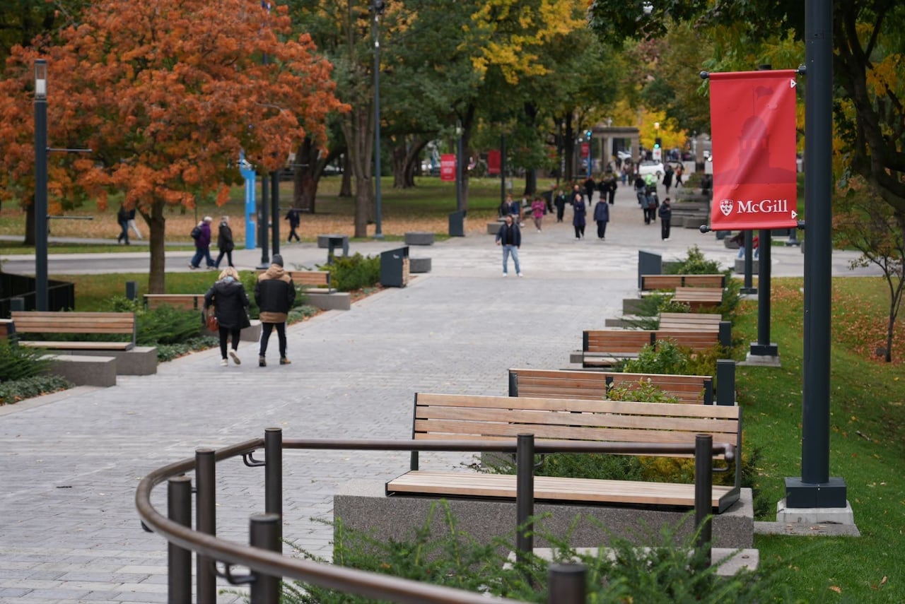 Students walking on a university campus.