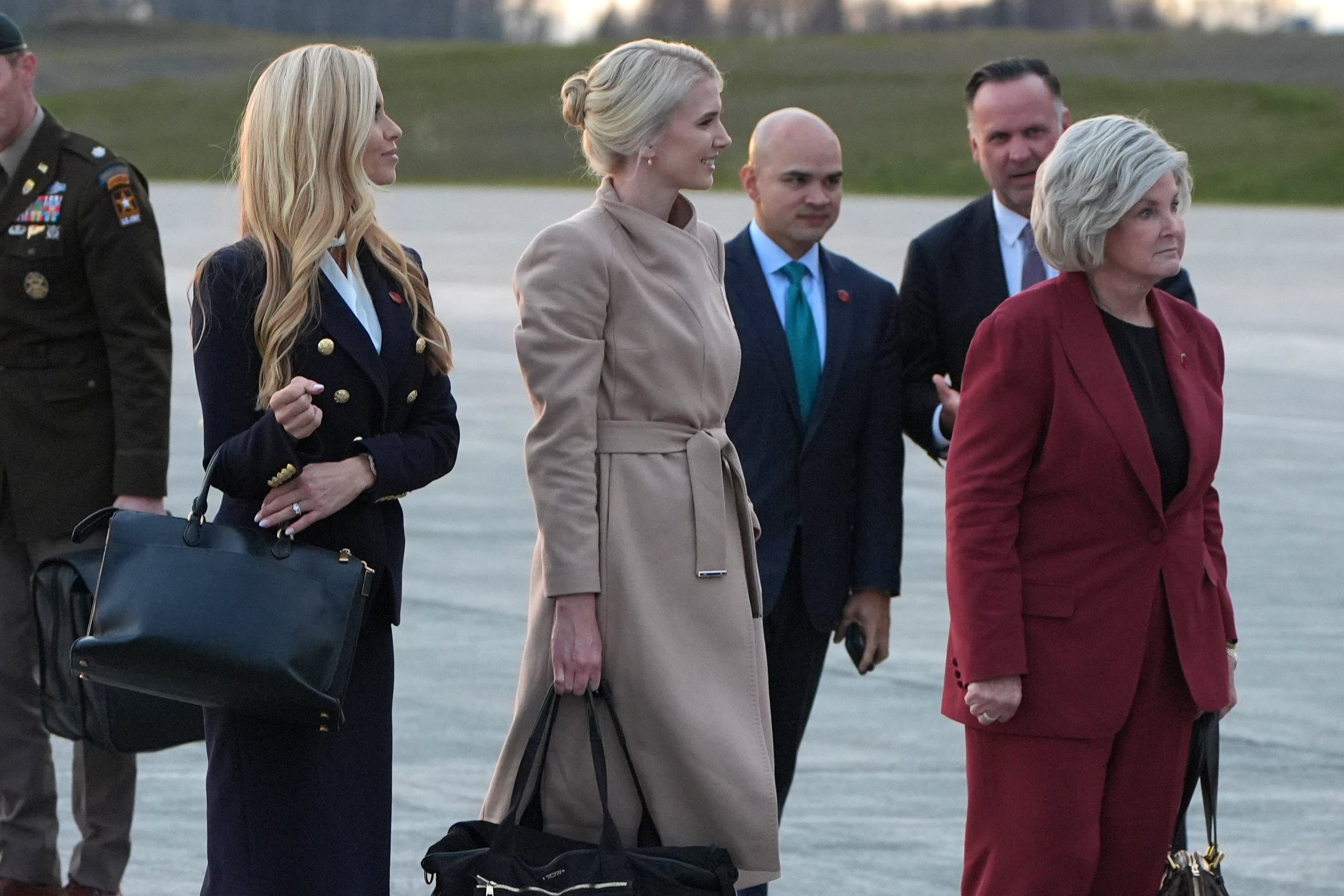 Natalie Harp (center) reportedly triggered Trump with printouts of news pieces on his discussions about whether to sack Chief of Staff Susie Wiles (far right)