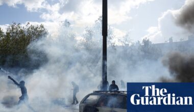 Police clash with protesters as tens of thousands take to streets across France | France